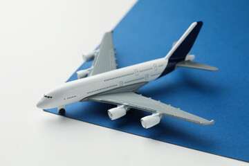 One plane model on color background, closeup