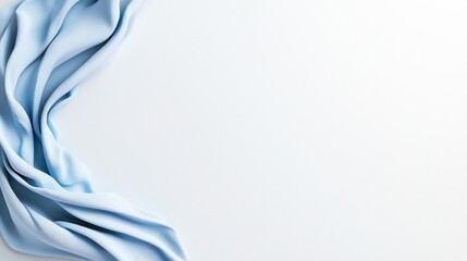 Light blue fabric draped on white background, copy space