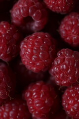 Close-Up of Fresh Ripe Red Raspberries with Detailed Texture and Vibrant Color