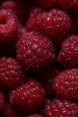 Close-Up of Fresh Ripe Red Raspberries with Detailed Texture and Vibrant Color