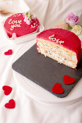 Heartfelt red and white love cake with roses and felt hearts