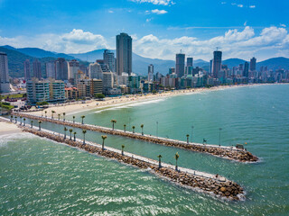 Itapema - aerial view of the beach and the piers of Itapema