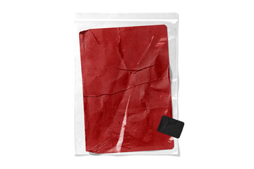 A wrinkled red paper sheet enclosed in a transparent ziplock bag against a black background. A minimalist and abstract concept suitable for creative design mockups.