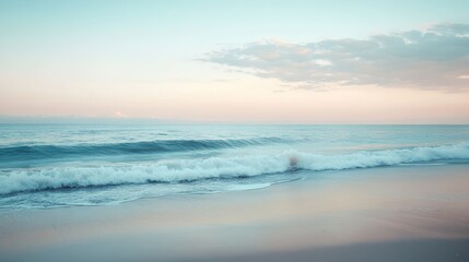 Waves softly breaking on a tranquil beach during daytime