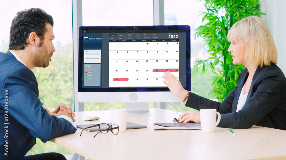 Poster calendar on computer software application for modish schedule planning for personal organizer and on