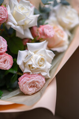 A Stunning Arrangement Featuring a Beautiful Bouquet of Pink and White Roses Alongside Lilies