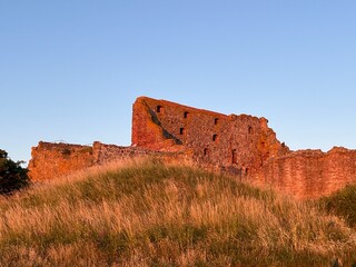 ruins of the old castle in the sunset