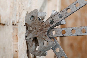 three metal axes in wooden block stand as target, throwing axes and knives, sports competition,...