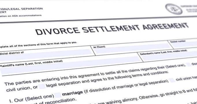 Divorce Settlement Agreement form, dissolution of marriage, close-up tracking shot over paper document, footage