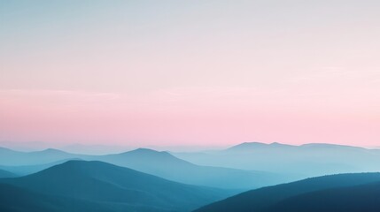 Serene mountain ranges are visible at dusk in landscape
