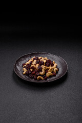 Mixture of roasted cashews and dried cranberries