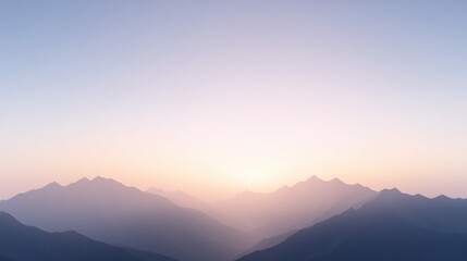Obraz premium A mountain range with a beautiful sunset in the background. The sky is a light blue color with a few clouds. The mountains are covered in snow and the sun is setting behind them. The scene is peaceful