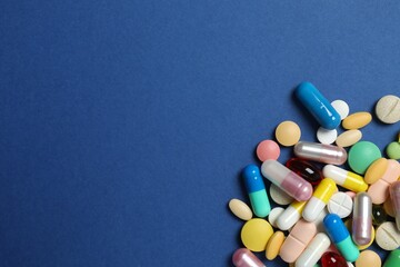 Various pills on a color background