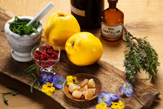 Still life of herbs and fruits used in alternative medicines.