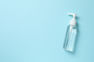 Natural cosmetic products. Cosmetic bottle a blue background, top view