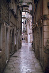 Obraz premium Charming tiny street with classical architecture in Split old town, Split, Dalmatia, Croatia
