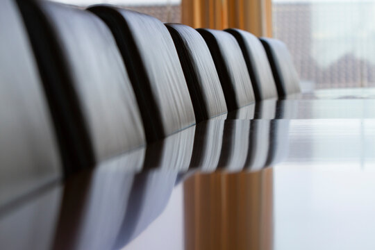 Empty meeting room table with chairs.