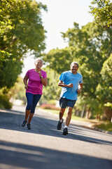 Obraz premium Runner, road and senior couple for exercise, training and cardio workout together. Retirement, marriage and mature man with woman for fitness and outdoors for wellness, health and body mobility
