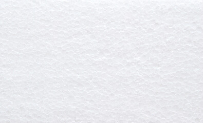 Fototapeta premium White expanding foam texture surface as background