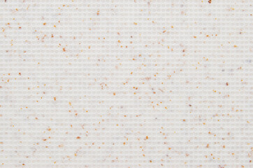Beige grain circle embossed texture as background
