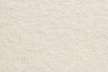 Beige soft fluffy fabric texture as background