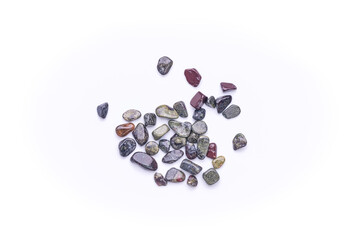 gravel chips Polished stack of blood dragon jasper isolated on white background top view
