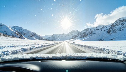 Snowy mountain road under bright sun, tranquil winter journey