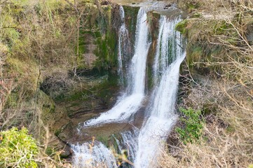 Natural waterfall in mountainous area, Penaladros waterfall in Cozuela, Burgos