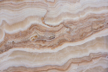 Gold marble pattern with white inclusions. Abstract texture and background