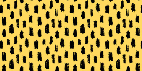Seamless abstract pattern with irregular black brush strokes on a yellow background. Modern artistic texture for fabric, wallpaper, branding, and creative projects. Trendy and bold hand drawn design.