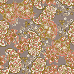 Gorgeous paisley seamless vector pattern with fantastic flowers and leaves. Bohemian textile print inspired by batik. Vintage style