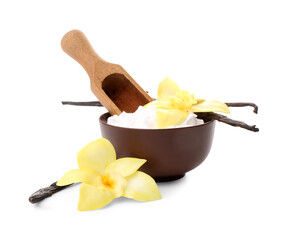 Bowl of vanilla powder with sticks and flowers on white background