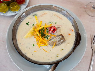 Sopa de mani is peanut soup made with beef, beef bones, potatoes and peas as the main ingredients. Latin American cuisine