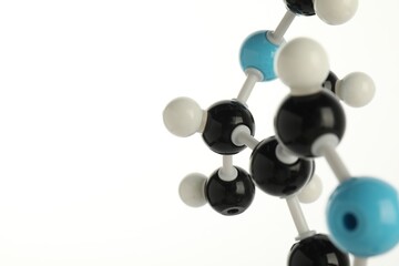 Chemical model of molecule on white background, closeup. Space for text