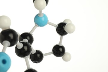 Chemical model of molecule on white background, closeup. Space for text