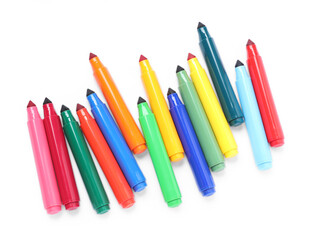 Many colorful markers isolated on white, top view
