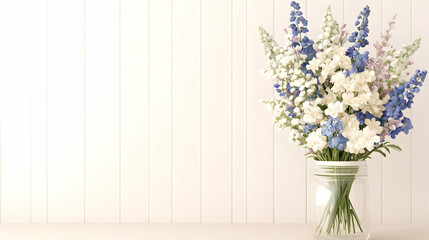 Spring bouquet in glass jar against white wood