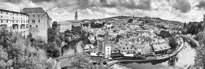 City landscape, panorama, banner - view over the historical part Cesky Krumlov with Vltava river in summer time, Czech Republic, in black-and-white color
