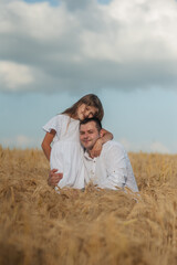 Unrecognizably happy parents with their daughters in casual clothes, running back holding hands
