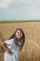 hild girl running field park. girl kid run in the park wheat field