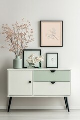 Modern living room cabinet with art and dried flowers