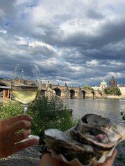 wine and oysters by the lake