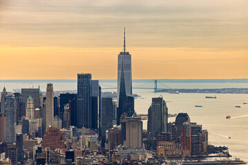A landscape view of Lower Manhattan in New York City with One World Trade Center in the background.
