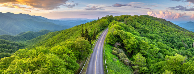 Evening mountain landscape of forest road in North Carolina Appalachians, USA. Blue Ridge Parkway...