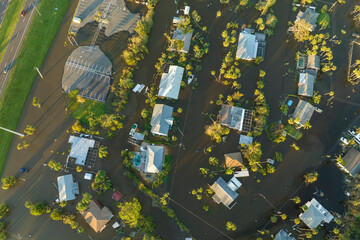 Flooded houses by hurricane Ian rainfall in Florida residential area. Consequences of natural...