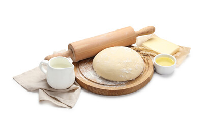 Rolling pin and different ingredients isolated on white