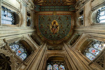 Interior of Peterborough Cathedral showing ceiling and stained glass windows