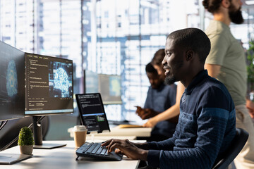 Computer scientist conducts code review to fix bugs, identifying performance and technical issues...
