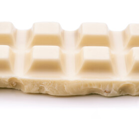 White chocolate bar with square pattern on white background