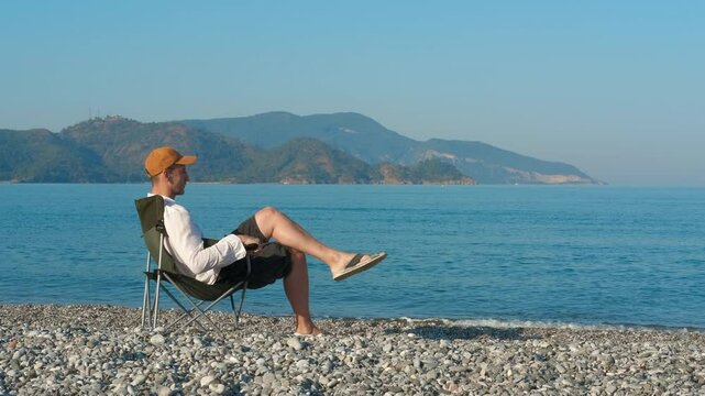 seaside vacation; camping; travel; vacation; sea; beach; one life; water vacation; tourist; relaxing; chair; seascape; view; summer; holiday; ocean; nature; sky; blue; water; coast; seaside; sitting